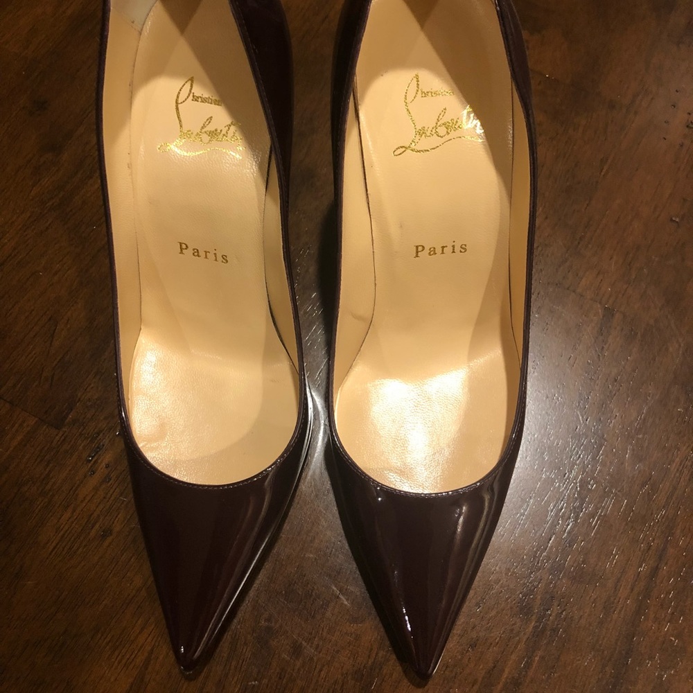 Christian Louboutin burgundy patent leather pumps
